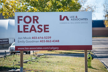 7 October 2023 - Calgary Alberta Canada Sign advertising commercial properties for lease and saleのeditorial素材