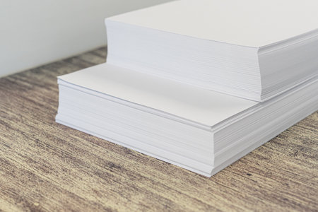 Piles of Legal and letter sized blank printing paper