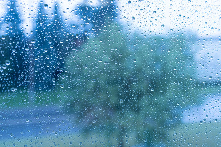 Rain drops on Window during rains showers