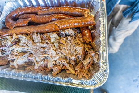 Pork and sausage tray for Barbeque Partyの写真素材