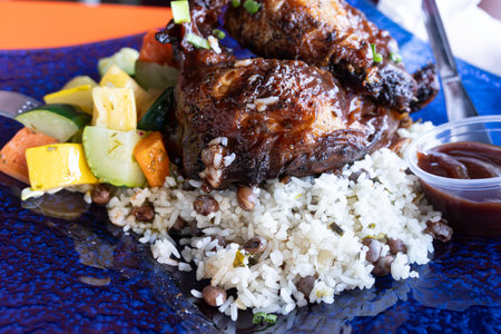 A Plate of Jerk Chicken with Rice and Beansの写真素材