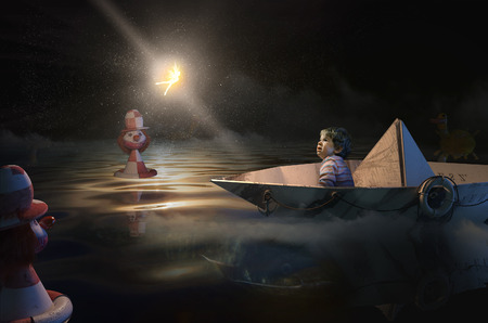 Crying girl in paper boat the nightの写真素材