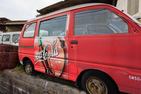 Okubo, Japan - May 6, 2023: Vintage red kei van painted with Coca Cola bottle logoのeditorial素材