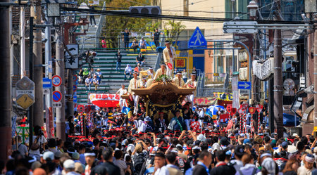 Kishiwada, Japan - September 17, 2023: Crowd and mikoshi portable shrine at Danjiri summer festivalのeditorial素材
