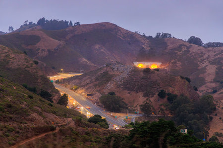 Early morning traffic on El Camino Real approaching Robin Williams Tunnel