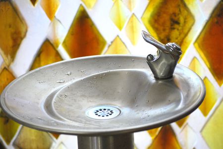 Water fountain inside a church building.の写真素材