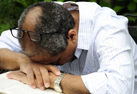 African american man tired from working all day.の写真素材