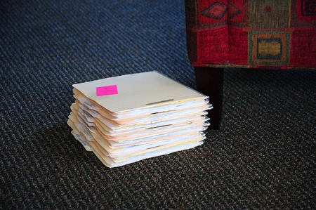 Case study files on the office floor.