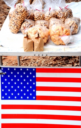 Organic peanuts for sale at a roadside curb.の写真素材