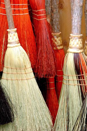 Colorful abstract brooms on display.