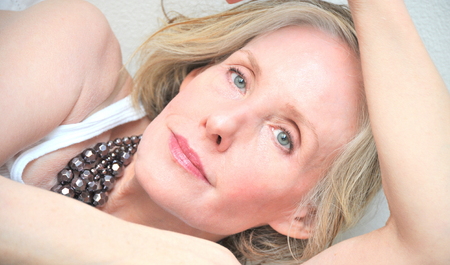 Mature female beauty expressions indoors.の写真素材