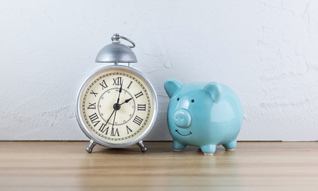 clock and piggy bankの写真素材