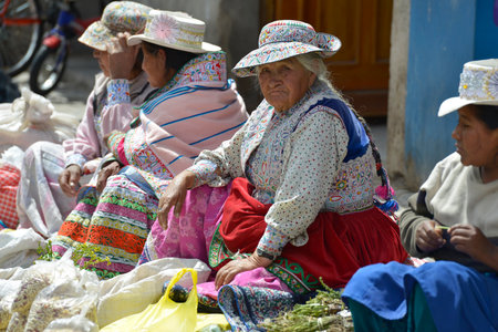 CHIVAY, PERU - SEPTEMBER 2: Unidentified Quechua people in Chivay market on September 2, 2015, Arequipa Region, Peruのeditorial素材
