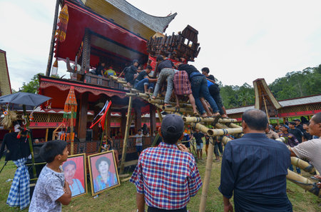 Tana Toraja, Sulawesi, Indonesia - August 15: Funeral ceremony on August 15, 2016 in Tana Toraja, Sulawesi, Indonesia. In Tana Toraja the funeral ritual is The most elaborate and expensive evenのeditorial素材