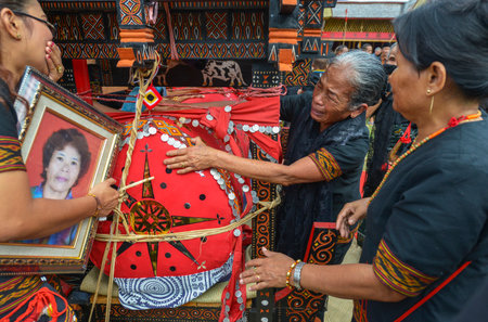 Tana Toraja, Sulawesi, Indonesia - August 15: Funeral ceremony on August 15, 2016 in Tana Toraja, Sulawesi, Indonesia. In Tana Toraja the funeral ritual is The most elaborate and expensive evenのeditorial素材