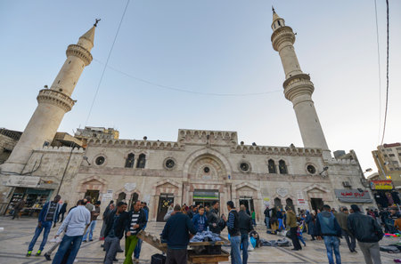 Amman, Jordan - December 9: People selling clothes in front of Al-Husseini mosque on December 9, 2016 in Amman, Jordan.のeditorial素材