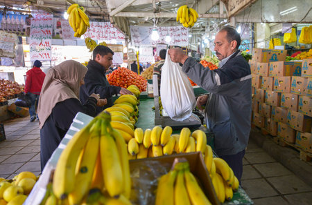 Aqaba, Jordan - December 8: A man selling fruit at the market Aqaba on December 8 2016 in Jordan.のeditorial素材