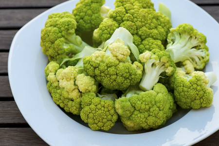 Fresh green broccoli on wooden background.の写真素材