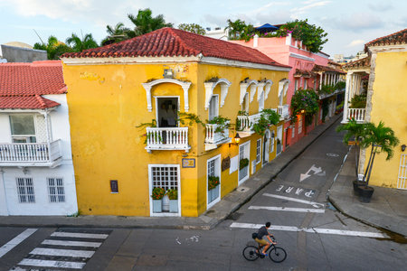Cartagena, Colombia - August 3: An unidentified man on a bicycle on a street in Cartagena on August 3, 2017 in Colombia.のeditorial素材