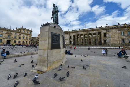 Bogota, Colombia - August 24: People in the Bolivar square next to the statue of Simon Bolivar and the National Capitol in the background on August 24, 2017 in Bogota, Colombia.のeditorial素材