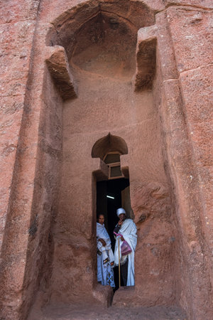 Lalibela, Ethiopia - January 6: Pilgrims visiting Bet Gabriel-Rufael, one of the churches excavated in the rock of Lalibela on January 6, 2018 in Ethiopia.のeditorial素材