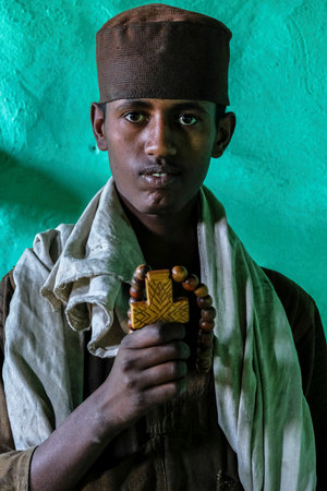 Tigray, Ethiopia - January 11: Portrait of an Orthodox Christian priest at the cliff-top monastery...