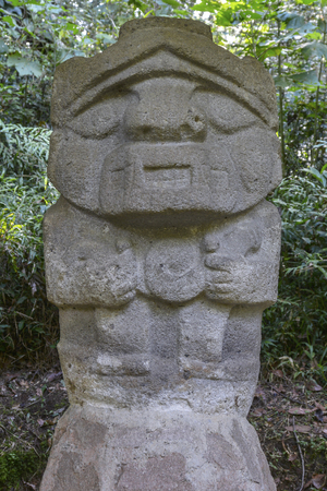 Ancient pre-columbian statues in San Agustin, Colombia. Archaeological Park, an altitude of 1800 meters at the source of the Magdalena River, in the Valley of the statues.の写真素材