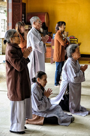 Dalat, Vietnam - August 14: People praying at the Chua Linh Quang Pagoda on August 14, 2018 in Dalat, Vietnam.のeditorial素材