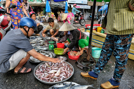 My Tho, Vietnam - August 9: People sells fish and seafood on street market on August 9, 2018 in My Tho, Vietnam.のeditorial素材