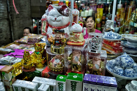 Ho Chi Minh City, Vietnam - August 7: Souvenirs on shelves in a shop in Ben Thanh Market on August 7, 2018 in Ho Chi Minh City, Vietnam.のeditorial素材