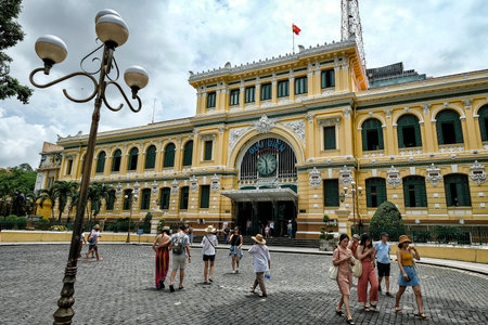 Ho Chi Minh City, Vietnam - August 7: People at the Central Post Office on August 7, 2018 in Ho Chi Minh City, Vietnam.のeditorial素材