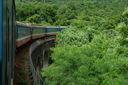 Da Nang, Vietnam - August 19: Train running through Hai Van Pass in the middle center of Vietnam on August 19, 2018 in Da Nang, Vietnam.のeditorial素材