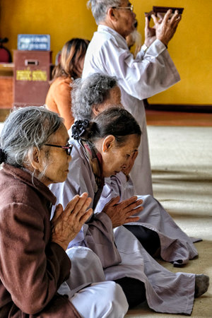 Dalat, Vietnam - August 14: People praying at the Chua Linh Quang Pagoda on August 14, 2018 in Dalat, Vietnam.のeditorial素材