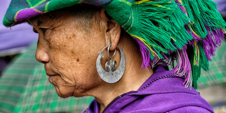 Bac Ha, Vietnam - August 26: Portrait of a woman seller of the Hmong indigenous tribe in the local market on August 26, 2018 in Bac Ha, Vietnam.のeditorial素材