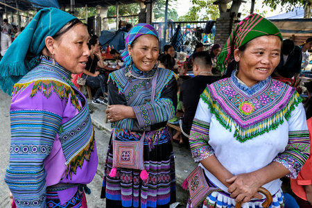 Bac Ha, Vietnam - August 26: Women seller of the Hmong indigenous tribe in the local market on August 26, 2018 in Bac Ha, Vietnam.のeditorial素材