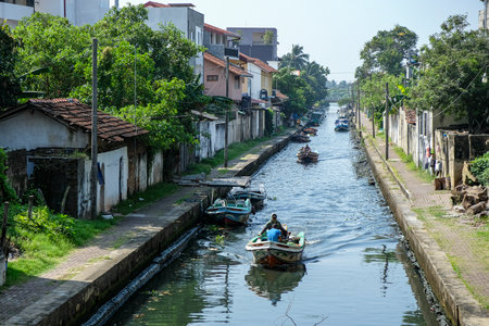 Negombo, Sri Lanka- January 2020: Boats passing the Hamilton? ? ? s channel on January 12, 2020 in Negombo, Sri Lanka.のeditorial素材