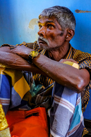 Kandy, Sri Lanka - January 2020: Man traveling by train from Nanu Oya to Kandy on January 25, 2020 in Kandy, Sri Lanka.のeditorial素材