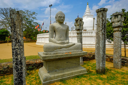 Anuradhapura, Sri Lanka - February 2020: Buddha statue in the Buddhist stupa Thuparama Dagoba on February 6, 2020 in Anuradhapura, Sri Lanka.のeditorial素材