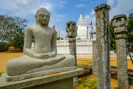 Anuradhapura, Sri Lanka - February 2020: Buddha statue in the Buddhist stupa Thuparama Dagoba on February 6, 2020 in Anuradhapura, Sri Lanka.のeditorial素材