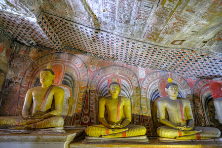 Dambulla, Sri Lanka - February 2020: Buddha statue inside Dambulla cave temple on February 8, 2020 in Dambulla, Sri Lanka. Cave II Maharaja Viharaya. Major attractions are spread over 5 caves, which contain statues and paintings.のeditorial素材