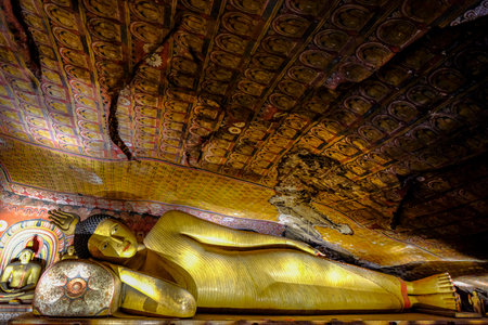 Dambulla, Sri Lanka - February 2020: Buddha statue inside Dambulla cave temple on February 8, 2020 in Dambulla, Sri Lanka. Cave III Maha Alut Viharaya. Major attractions are spread over 5 caves, which contain statues and paintings.のeditorial素材