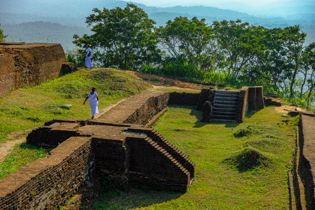 Sigiriya, Sri Lanka - February 2020: People visiting the fortress of Sigiriya Rock on February 9, 2020 in Sigiriya, Sri Lanka.のeditorial素材