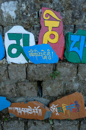 McLeod Ganj, India - May 2021: Prayer stones located around the Tsuglagkhang Complex on May 21, 2021 in Dharamshala, Himachal Pradesh, India.のeditorial素材