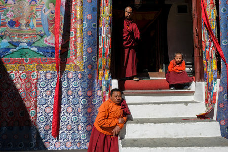 Marpha, Nepal - November 2021: Buddhist monks visiting the Marpha Buddhist monastery on November 3, 2021 in Marpha, Mustang District, Nepal.のeditorial素材