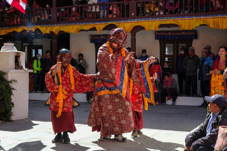 Marpha, Nepal - November 2021: Lama dance at the Marpha Buddhist Monastery in the Mustang district on November 3, 2021 in Marpha, Nepal.のeditorial素材