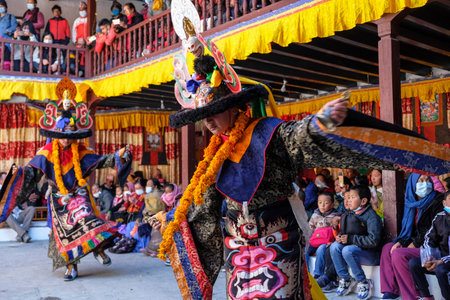 Marpha, Nepal - November 2021: Lama dance at the Marpha Buddhist Monastery in the Mustang district on November 3, 2021 in Marpha, Nepal.のeditorial素材
