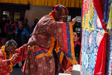 Marpha, Nepal - November 2021: Lama dance at the Marpha Buddhist Monastery in the Mustang district on November 3, 2021 in Marpha, Nepal.のeditorial素材
