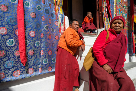 Marpha, Nepal - November 2021: Buddhist monks visiting the Marpha Buddhist monastery on November 3, 2021 in Marpha, Mustang District, Nepal.のeditorial素材