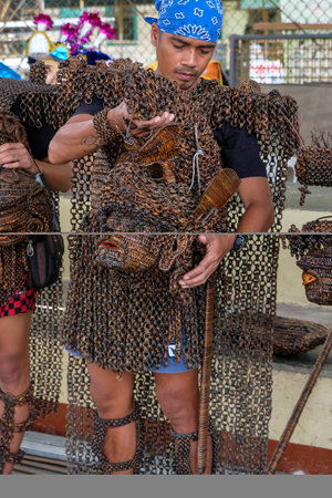 Mogpog, Philippines - April 2022: A participant of the Moriones Festival held during Holy Week in Mogpog on April 13, 2022 in Marinduque, Philippines.のeditorial素材