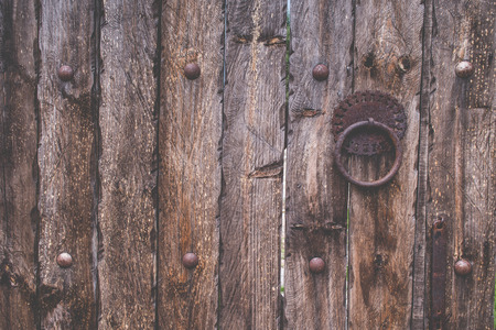 Old wood texture door with boltの写真素材